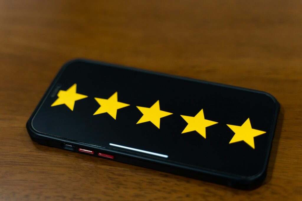 customer review good rating concept select five star on screen for positive feedback